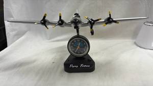 lot 166 image: Flying Fortress Airplane Model Clock with Quartz Alarm