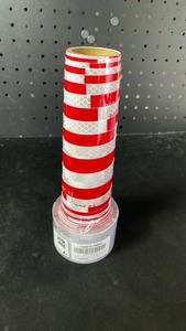 lot 10005 image: Red and White Reflective Striped Safety Tape Roll