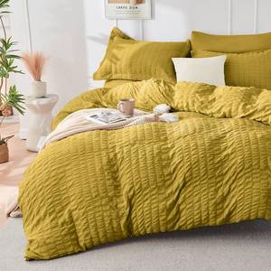 lot 20336 image: HYMOKEGE Mustard Yellow Duvet Cover Queen Size, Ultra Soft 3-Piece Seersucker Duvet Cover Set with Zipper Closure, Soft Brushed Microfiber Bedding Set with 8 Corner Ties (90x90, 2 Pillowshams)