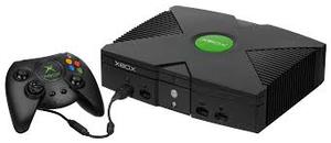 lot 9329 image: First Generation Xbox console scratches on the outside powers on and disc tray open but red circle around tray button with controller and chords