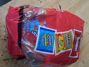 lot 4479 image: Bag of jolly ranchers, gummy bears, twizzlers