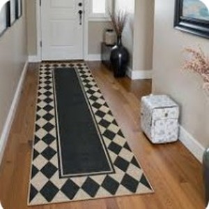 lot 2221 image: Black and brown rug runner 6 ft by 2 ft