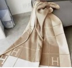 lot 8042 image: Woven Throw Blanket with Grid Pattern and Geometric Design 50x60