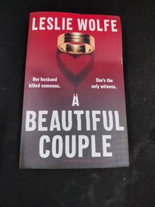lot 6327 image: A Beautiful Couple by Leslie Wolfe Hardcover Book