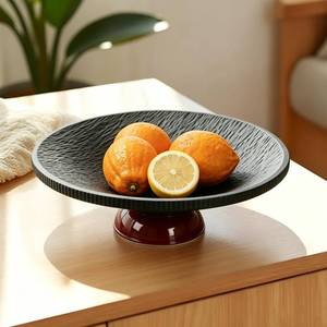 lot 7108 image: Large Fruit Bowl for Kitchen Counter, Decorative Pedestal Bowl Dessert Platter with Drain, 9.84 Diameter & 3.15 Height Fruit Basket Bowl for Fruits, Dessert, Snack (BLACK)