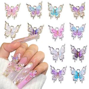 lot 12445 image: 12Pcs 3D Mix Color Aurora Bling Butterfly Nail Charms Gold Silver Rhinestones Jewelry Resin Mold Crafts Design for Women Acrylic Nails