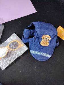 lot 10424 image: Pawcratean Blue Dog hat and sunglasses with Golden Dog Design