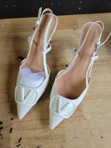 lot 19384 image: White Pointed Toe Slingback Heels with Buckle Detail, Size 8.5