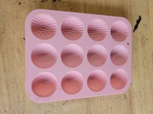 lot 20343 image: Pink Silicone Chocolate Mold 12-Cavity Round Sphere Golf Ball Design