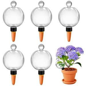 lot 11380 image: DI QIU REN 19oz Extra Large Self Watering Globes, Automatic Plant Waterer with Glass Stopper - Slow Release Watering Bulbs & Planter Insert, Top-Fill Water Spikes Stakes for Indoor Plants (4, Clear) (Slight Use)