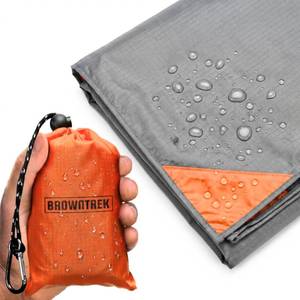 lot 2458 image: BROWNTREK Pocket Blanket (Water Resistant) - Ultralight Sand Proof Beach Mat for Hiking, Festivals, & Travel - Compact Ground Cover Fits 2-4 Adults (Stake Loops Included)