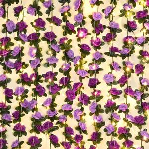 lot 11426 image: BLEUM CADE 12Pcs 98.4Ft Flower Garland Artificial Rose Vines with 98.4Ft String Lights, Cute Fake Hanging Flower Vines Floral Garland Decorations for Wedding Party Wall Room Decor Aesthetic