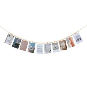 lot 12222 image: KLOGTSIND Hanging Photo Display with Clips, Boho Wooden Bead Garland Collage Picture Frame Wall Decor, Photo String with 10 Clips for Bedroom Room Dorm Cubicle Decor, Christmas Teen Girls Gifts