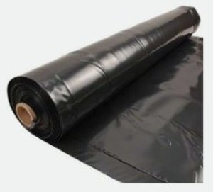 lot 1047 image: Black plastic tarp size unknown