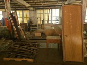 lot 4663 image: Contents of Bay including Multiple Wooden Doors, Scrap Metal And Walk-In Door