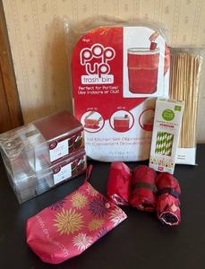 lot 2002 image: Party Supplies and Packable Nylon Bags with (3) Floral Designs & Carry Bag