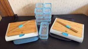lot 2019 image: Pair of Prepd Pack bento boxes feature a sustainable bamboo casing with modular, leak-proof containers