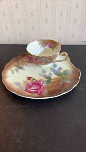lot 2071 image: Porcelain Teacup and Snack Saucer Set with Floral Decoration