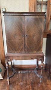 lot 2077 image: Vintage Two-Door Cabinet with Shelves and Turned Legs 52 by 24 by 17