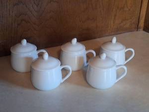lot 3032 image: White porcelain pot de creme custard cups with lids.
