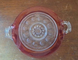 lot 3054 image: Pink Glass Round Serving Bowl with Handles and Decorative Center Pattern 9.5 Inch