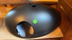 lot 4046 image: NEW Egg Shaped Cat Box durable, 100% recyclable anti-UV plastic that resists urine acidity, it features a discreet compartment under the lid that holds anti-odor tablets
