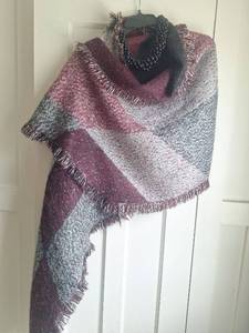 lot 5071 image: Knit Poncho with Fringe Trim and Beaded Necklace