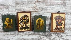 lot 105 image: Hummel Style Children Wall Plaques Set of 4