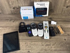 lot 181 image: Mixed Electronics Lot - DirecTV Remotes, WiFi Camera, Password Safe & More