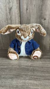 lot 211 image: Peter Rabbit Plush Stuffed Animal with Blue Jacket