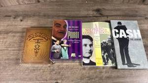 lot 286 image: 4-Item Media Lot Cash The Legend, Poirot, Eagles Farewell, Shepherd Combat Boots Book