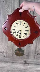 lot 288 image: Red Wall Clock with Roman Numerals and Pendulum untested