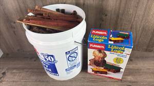 lot 302 image: Playskool Original Lincoln Logs 103 Pieces with Storage Bucket