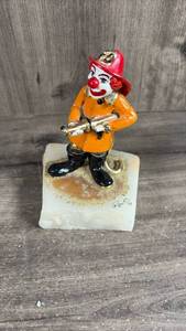 lot 383 image: Clown Figurine with Red Hat Orange Jacket on Marble Base Signed Ron Lee