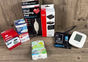 lot 387 image: Medical Supply Lot CVS Health Heating Pad Omron Blood Pressure Monitor Gauze Pads