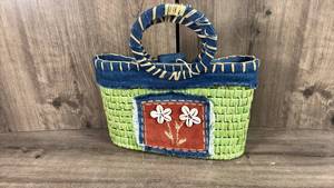 lot 443 image: Woven Straw Basket with Blue Fabric Trim and Embroidered Floral Patch