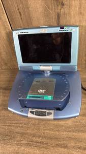 lot 476 image: Portable DVD Player with 7in LCD Display Multi-Disc MP3 CD DVD668