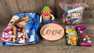 lot 480 image: Disney Frozen Sleeping Bag with Mr. Potato Head Plush, Crayons, Colored Pencils & Decor Sign Lot