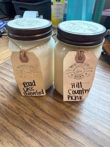 lot 640 image: 2pack of whiskey boat 16 ounce candles