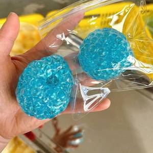 lot 693 image: Handmade Stress Reliever Balls with Noise, 3 Red Clear & Blue