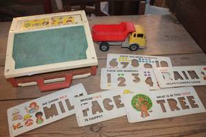 lot 2173 image: Vintage Fisher Price Desk and Hubley Dump Truck