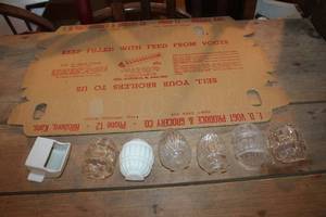 lot 2251 image: Vintage Glass Bird Waterers and Cardboard Egg Cartons