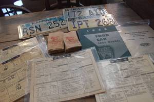 lot 2299 image: Vintage 1955 FORD Car Manual, License Plates & More