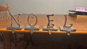 lot 55 image: NOEL Silver Chrome Christmas Stocking Holders Set of 4