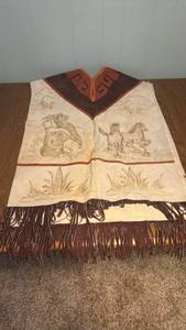 lot 83 image: Horse and Western Theme leather Pancho with Fringe Trim