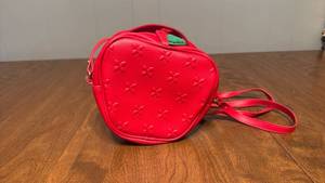 lot 115 image: Red Apple-Shaped Crossbody Bag with Green Leaf Detail