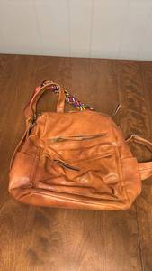 lot 119 image: Orange Leather Shoulder Bag with Colorful Woven Strap