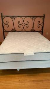 lot 918 image: King Metal Headboard mounted on a Queen Bed Frame with Simmons queen Mattress and box spring