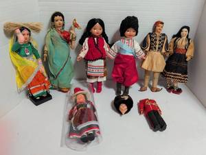 lot 1050 image: International Costume Dolls Collection 9-Piece Lot. Most are 11