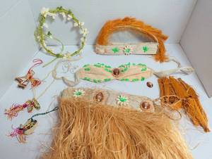 lot 1053 image: 1970s Hawaiian luau grass skirt top and headdress for children. Includes tassles